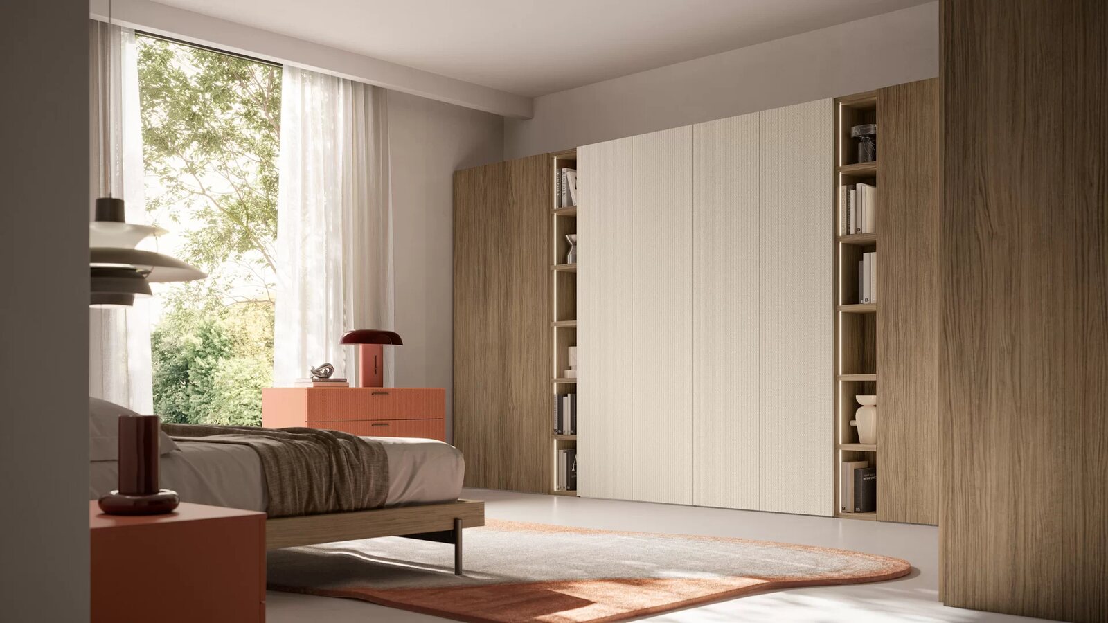A bedroom with a cabinet wall and open shelving beside the bed.